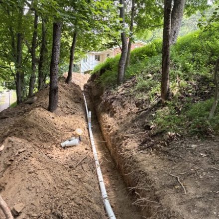 Open trench with new pipe run